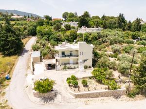an aerial view of a house with a road at Aelia Prime Experience 1 in Kos