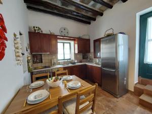 Η κουζίνα ή μικρή κουζίνα στο Village Sense, Pergola & Unlimited View +16 φωτογραφίες