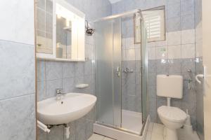 Koupelna v ubytování Rooms and apartments PALMA B&B