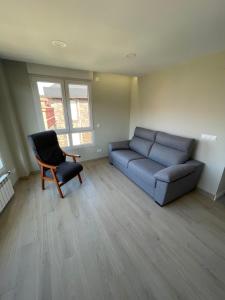Ein Sitzbereich in der Unterkunft Apartamento Recién Reformado en Somo junto iglesia