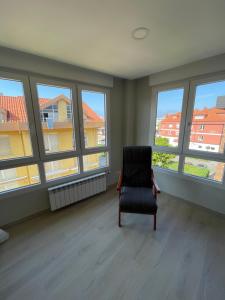 Ein Sitzbereich in der Unterkunft Apartamento Recién Reformado en Somo junto iglesia