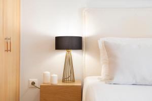 Posteľ alebo postele v izbe v ubytovaní Adria Luxury Apartments