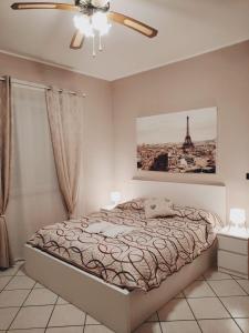 Llit o llits en una habitació de I capricci dell'Etna 2 di Puglisi