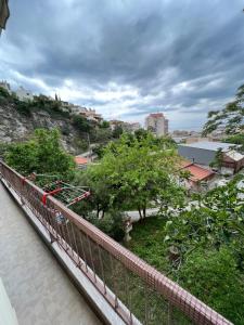 a bridge over a river next to a city at VALANTIS APARTMENT in Kavála