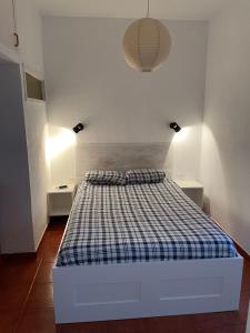 Кровать или кровати в номере Apartamento Playa Chica Tenerife