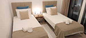 Postel nebo postele na pokoji v ubytování Faro Comfy Ensuite Guest House