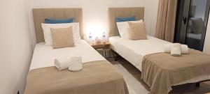 Postel nebo postele na pokoji v ubytování Faro Comfy Ensuite Guest House