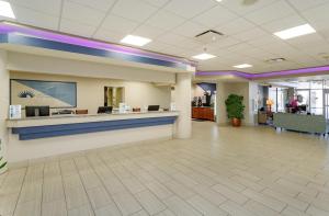a lobby of a hospital with a waiting room with a reception counter at Oceanfront Condo at Daytona Beach Resort in Daytona Beach