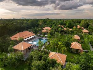 an aerial view of a resort with a swimming pool at Farmhouse Resort & Spa in Kampong Chhnang