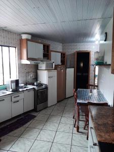 Fotografie z fotogalerie ubytování 8 Quarto Cama Queen e SmartTv Netflix v destinaci Itajaí
