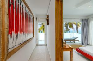 Ένα ή περισσότερα κρεβάτια σε δωμάτιο στο Deluxe Beachfront Penthouse with Panoramic Ocean Views
