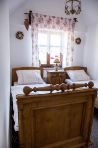Postel nebo postele na pokoji v ubytování Penzion U Jindry
