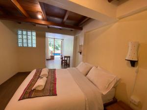 Postel nebo postele na pokoji v ubytování Mistico Machupicchu Eco B&B