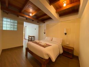 Postel nebo postele na pokoji v ubytování Mistico Machupicchu Eco B&B