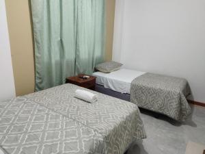 Postel nebo postele na pokoji v ubytování Casa D'Lucas