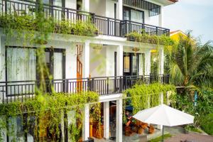 Balkón nebo terasa v ubytování Sunkised Paddy Hoi An Villa