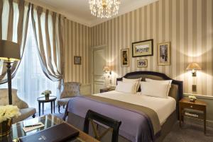 Кровать или кровати в номере Hotel Westminster