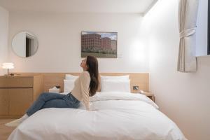 Aank Hotel Cheongju Uam 1st客房内的一张或多张床位