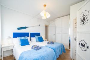 Кровать или кровати в номере Playa Apartamento Frente al mar