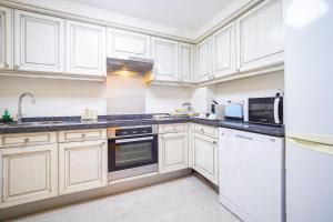 Кухня или мини-кухня в Playa Apartamento Frente al mar
