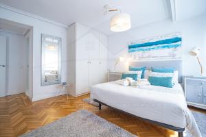 Кровать или кровати в номере Playa Apartamento Frente al mar