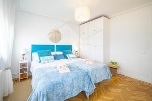Кровать или кровати в номере Playa Apartamento Frente al mar