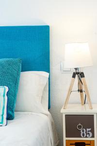 Кровать или кровати в номере Playa Apartamento Frente al mar
