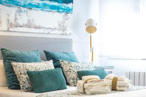 Кровать или кровати в номере Playa Apartamento Frente al mar