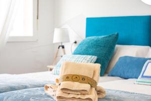 Кровать или кровати в номере Playa Apartamento Frente al mar