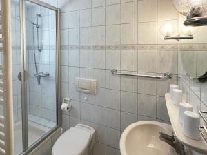 Koupelna v ubytování Haus *Üüs Aran* Wohnung Nr. 4 + 21 fotografií