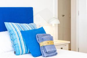 Кровать или кровати в номере Playa Apartamento Frente al mar