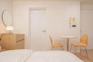 Aank Hotel Cheongju Uam 1st客房内的一张或多张床位