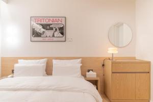 Aank Hotel Cheongju Uam 1st客房内的一张或多张床位