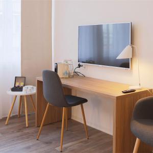TV a/nebo společenská místnost v ubytování Hotel Work Life Residence am Bahnhof