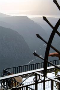 a view of the ocean from a mountain at Hotel Varonos in Delphi