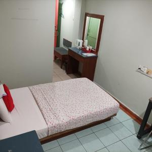 Postel nebo postele na pokoji v ubytování Highway Inn