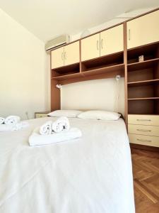 Posteľ alebo postele v izbe v ubytovaní Lemon Tree Apartments