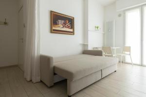 A bed or beds in a room at Casa Aleardi grazioso e nuovissimo monolocale con balcone