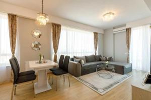 Et opholdsområde på APARTAMENT YNA + 11 billeder