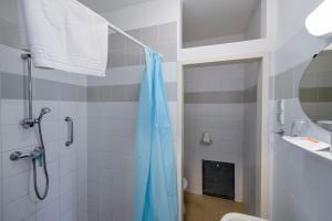 Koupelna v ubytování Campus Hotel