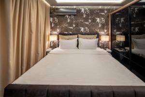 Katil atau katil-katil dalam bilik di Apartment Deluxe Vision