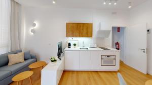 Кухня или мини-кухня в Apartamentos La Casa El Palo
