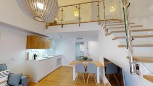 Кухня или мини-кухня в Apartamentos La Casa El Palo

