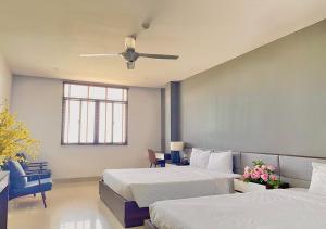 Katil atau katil-katil dalam bilik di My Khe 2 Da Nang Seafront Hotel