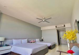 Katil atau katil-katil dalam bilik di My Khe 2 Da Nang Seafront Hotel