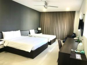 Katil atau katil-katil dalam bilik di My Khe 2 Da Nang Seafront Hotel
