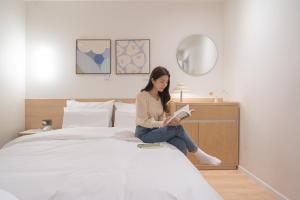 Aank Hotel Cheongju Uam 2nd客房内的一张或多张床位