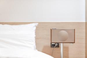 Aank Hotel Cheongju Uam 2nd客房内的一张或多张床位