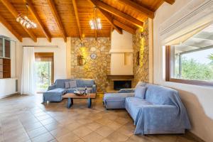 Posezení v ubytování Entheon Olive Villas - Poolside Retreats