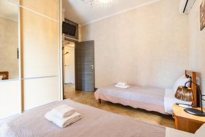Postel nebo postele na pokoji v ubytování Entheon Olive Villas - Poolside Retreats